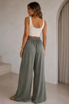 Olivefarbende Satinhose